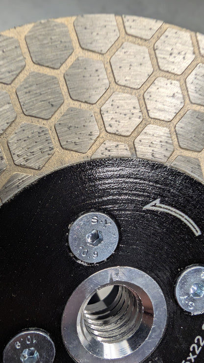 Segmented diamond blade with flange for tile edge beveling (mitre cuts).